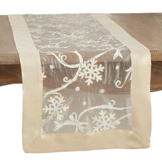 a table runner with snowflakes on it