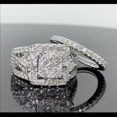 an engagement ring with two rows of diamonds on it