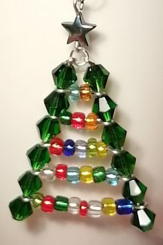 a christmas tree ornament hanging on a wall