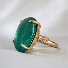 One Of A Kind: Oval Cabochon Emerald Diamond ring, 9ct – Tippy Taste Jewelry Fine Jewelry Emerald Oval Cabochon Ring, Fine Jewelry Emerald Ring With Oval Cabochon, Yellow Gold Emerald Ring Oval Cabochon, Yellow Gold Emerald Ring With Oval Cabochon, Luxury Oval Emerald Birthstone Ring, Emerald Oval Cabochon Ring As A Gift, Luxury Emerald Ring With Oval Cabochon, Elegant Cabochon Emerald Ring, Elegant Emerald Ring With Cabochon Cut