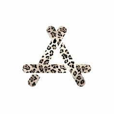 the letter is made up of leopard print