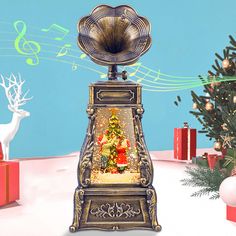 there is a christmas tree and musical notes on the wall next to this music box