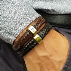 This man bracelet is made with brown or black leather and has a golden stainless steel bar and clasp. The bracelet can be personalized on both the front and or the clasp. Engraved or not, this bracelet is perfect to complement any outfit! Bracelet Length / Wrist Size technique (as shown in product photos) 1- Wrap a cord at the smallest part of your wrist, 2- Measure it flat with a ruler.  3-  Please do not add any space, we will take care of that to make the bracelet comfortable. For the engraved text, maximum two initials if it is on the front and up to 20 characters on the clasp (front and/or back sides). The clasp will be engraved on the inside and on the largest of the two parts by default unless you request otherwise. Fonts: Below is a list of fonts that you can select from if you wis Engraved Leather Bracelets, Men Leather Bracelet, Bracelet Thick, Man Bracelet, French Script, Stainless Steel Bar, Personalised Gifts For Him, Christmas Gifts For Him, Mens Leather Bracelet