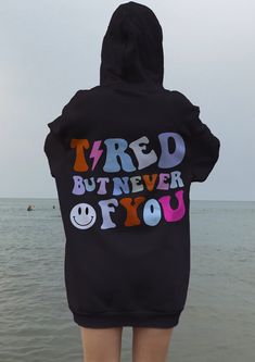 Tired But Never Of You Hoodie, Positivity Hoodie, Trendy Hoodie, Aesthetic Sweatshirt, Cozy Hoodie A unisex heavy blend hooded sweatshirt is relaxation itself. The material is a thick blend of cotton and polyester. This makes for a plush, soft feel alongside warmth. It's also a great surface for printing. There are no side seams. A spacious kangaroo pocket hangs in front. The hood's drawstring is the same color as the base sweater. \n.: 50% cotton, 50% polyester\n.: Medium-heavy fabric (8.0 oz/y Hoodie Merch, Positive Hoodie, Clothes Business, Aesthetic Sweatshirt, Hoodie Aesthetic, Cozy Hoodie, Really Cute Outfits, Oversize Hoodie, Sweatshirt Designs