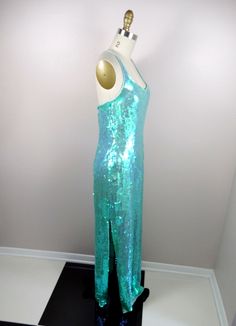 "This is a JAW-DROPPING vintage gown! It's fully embellished with iridescent sequins and in perfect condition! Measurements: Bust - 34\" Waist - 27\" Hips - 36\" Length - 59\" This item comes from a pet-free and smoke-free home. If you would like more info or have any questions, please don't hesitate to ask!" Glamorous Mermaid Sequin Dress For Wedding, Glamorous Sequined Mermaid Cocktail Dress, Sequined Full Length Evening Gown, Full Length Sequin Evening Gown, Full-length Sequin Gown For Prom Season, Embellished Mermaid Evening Dress For Party, Sequin Mermaid Maxi Dress For Prom, Mermaid Sequin Dress For Wedding And Party Season, Sequined Maxi Length Mermaid Dress For Prom