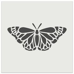 a black and white butterfly on a gray background