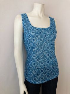 Vintage Women's 70's NOS, Blue, Floral, Tank Top by White Stag (L) by Freshandswanky on Etsy Fitted Blue Cotton Top, Stretch Cotton Floral Print Tops, Stretch Cotton Tops With Floral Print, Blue Printed Sleeveless Top, Blue Stretch Cotton Blouse, Cotton Stretch Floral Print Blouse, Stretch Cotton Blue Blouse, Blue Floral Print Sleeveless Top, Blue Sleeveless Floral Print Top