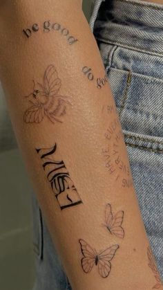 a woman's arm with butterflies on it and the words be good to each other