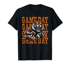 a black t - shirt with an orange tiger on it saying gameday games day