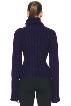 46% acrylic 26% mohair 19% polyamide 7% polyester.  Made in Italy.  Hand wash.  .  Turtleneck styling, Wrap detail with gold-tone buckle at waist.  Surplice neckline.  Ribbed knit fabric.  .  .  .  .  .  .  .  .  . Elegant Purple Sweater For Fall, Luxury Fitted Sweater For Formal Occasions, Luxury Fitted Formal Sweater, Fitted Mohair Turtleneck Sweater, Elegant Purple Sweater For Winter, Designer Fitted Sweater For Formal Occasions, Luxury Fitted Fall Sweater, Luxury Fitted Sweater For Fall, Fitted Mohair Sweater For Fall