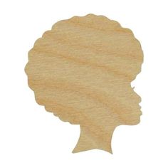 a wooden cutout of a woman's head in profile, with the shape of a