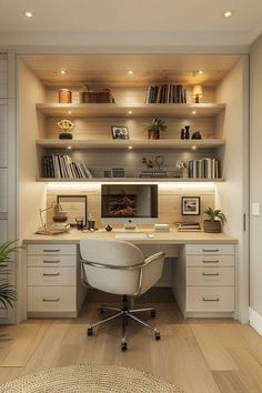 a home office with built - in shelving and desk