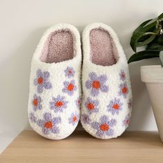 Cozy and Fluffy Slip-On Step into a world of pure comfort with our cozy and fluffy Purple Flowers Slip-on Slippers! These slip-on slippers give your feet a soft, cushiony embrace. Perfect for those cozy moments at home, they are your go-to for unbeatable warmth and comfort. Non-slip Sole For Safety and Style Enjoy the perfect blend of safety and style as you stroll through your home! These flower slippers come with a non-slip sole that grips various surfaces with ease, giving you confidence and stability with every step. Chic Floral Design These fashionable slippers feature a vibrant purple flower design, blending comfort with style effortlessly. Not only are they a cozy accessory, but they also add a touch of flair to your loungewear. Product Details Pattern: FlowersType: Slip-onSeason: A Flower Slippers, Plush Slippers, Cozy Accessories, Reindeer Headband, Cozy Moments, Vibrant Purple, Slippers Cozy, Buy 1 Get 1 Free, Black And White Prints