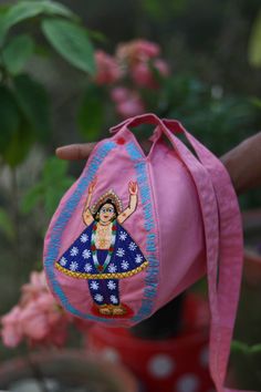 Beautiful handmade pure cotton pink embroidered Lord chaitanya mahaprabhu & nityananda prabhu japa bag, chanting bag, prayer bag Fabric- Cotton, Washable, strong double stiching. color won't fade. one zip pocket. Easy to carry. We also make customized Japa bag with customized design.  everybody should do chanting mahamantra as it heals our inner self. Kindly share your phone number after placing a order. We Gouranga Dress offers Devotional products like deity idol, dresses, wigs, crowns & ornaments, cups and other accessories. we are always at your service. we would be more happier if you we can make you happy. Lord Chaitanya Mahaprabhu, Nityananda Prabhu, Lord Chaitanya, Chaitanya Mahaprabhu, Bag Fabric, Fabric Cotton, Phone Number, Phone Numbers, Pure Cotton