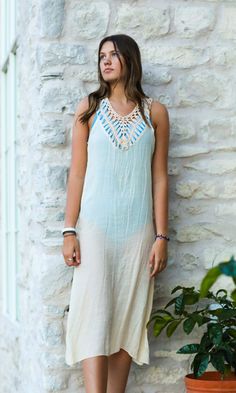 Looking for the perfect dress cover-up? We’ve got you covered! We love the light-weight linen, crochet detail, and fun tassels on the back of this beautiful swim cover. * Model is 5’7 wearing size M Chic Crochet Trim Dress For Beach Cover-up, Chic Crochet Trim Dress For Beach, Chic Lace Trim Maxi Dress For Beach, Lace Trim Beach Cover-up Dress, Spring Beachwear Dress With Crochet Trim, Chic Crochet Trim Beach Dress, Flowy Boho Dress With Lace Trim For Beach, Bohemian Lace Trim Dress For Vacation, Bohemian Sleeveless Crochet Dress For Poolside