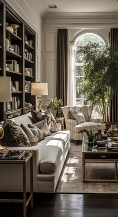 a living room filled with lots of furniture and a tree in the middle of it