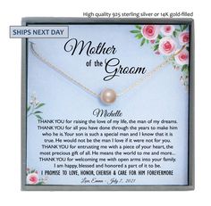 mother of the bride necklace with pink roses on it in a carded gift box