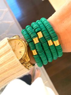 "This listing is for 1 Jade Bracelet. Each bracelet is hand-beaded with African clay discs and accented with a brushed gold cylinder bead. The bracelet is made with stretch elastic which makes it comfortable and easy to wear. My bracelets are made to fit an average wrist size of 6.5\"-7\". Take a look around my shop for additional colors to add to your stack! The more the better!" Beads Candy, White Bracelets, Jade Bracelet, Stackable Bracelets, Candy Stripes, Heishi Beads, Oct 31, Photo Bracelet, Pink Flamingos