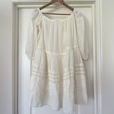 Nwt Free People Ivory Bohemian Candyshop Off The Shoulder Mini Dress Size: M Color: Ivory Length: 31” Fully Lined 100% Cotton White Peasant Dress For Spring Beach, Off White Bohemian Mini Dress For Brunch, Bohemian Off-white Dresses For Day Out, White Peasant Dress For Spring, White Cotton Peasant Dress For Spring, White Long Sleeve Peasant Dress For Summer, White Peasant Dress For Summer, White Bohemian Cotton Peasant Dress, White Flowy Peasant Dress For Spring