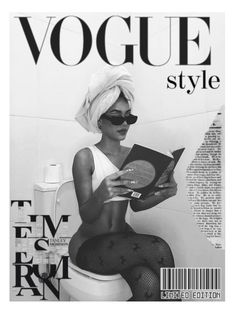 a black and white photo of a woman sitting on a toilet with a magazine in front of her