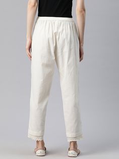 This Straight Solid Pant from Piroh exhibits partially elasticated waistband, slits on hem with lace detail, 1 side pocket. Tailored from Cotton. Product Length: 37 Inches. Description  Size - Measuring Unit     : Regular Size                                   :  ( S, M, L, XL, XXL )  Key Features                     Women::Fashion::Light Beige::Ethnic Motifs::Formal Trouser Fit                                      :Regular Fit Ideal For                           :Women Fabric Relaxed Fit Cotton Bottoms Ankle-length, Cotton Ankle-length Bottoms Relaxed Fit, Cotton Ankle-length Bottoms With Relaxed Fit, Cotton Wide Leg Pants Ankle-length, Casual Cotton Pants With Lace Trim, Ankle-length Cotton Bottoms With Elastic Waistband, Ankle-length Wide Leg Cotton Pants, Cotton Ankle-length Wide Leg Pants, Summer Daywear Pants With Lace Trim