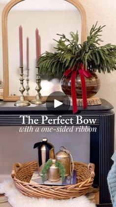 the perfect bow with a one - sided ribbon is displayed in front of a mirror