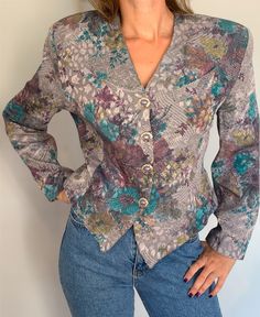 This fine and romantic jacket has an elegant feel to it. You can wear it with jeans, trousers or even skirts. Suitable for small to medium size. Shown on model size : S  Measurements:  Height: 54 cm Bust: 50 cm Waistline: 41 cm Shoulder to shoulder: 49 cm -Please note that all items in my shop are vintage and may have signs of wear and age including scratches, tarnishing etc. Please see photos for quality.  -Also please review and feel free to ask any questions you might have.  -Thank you for taking the time to look at my item why don't you check through my other items while you are here. Casual Blouse For Spring Vintage Fashion, Casual Blouse For Vintage Fashion In Spring, Spring Vintage Button-up Tops, Vintage Long Sleeve Tops For Spring, Spring Vintage Long Sleeve Tops, Fitted Vintage Blouse For Fall, Fitted Blouse For Fall Vintage Fashion, Fitted Long Sleeve Floral Blazer, Spring Vintage Fashion Blouse With Buttons