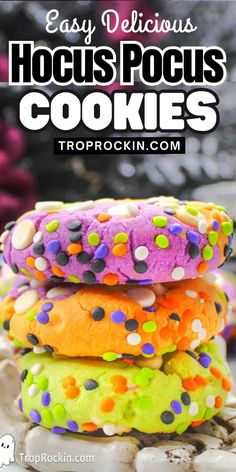 colorfully decorated cookies stacked on top of each other with the words easy delicious hocpspocus cookies