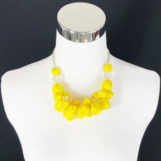 Yellow Large Beaded Necklace Clear Faceted Beads Silver Tone Fashion Jewelry New Approximate Size: 16-20 Inches, Choker/Princess Length New Without Tags Condition Handmade Yellow Multi-strand Beaded Necklaces, Yellow Faceted Beads Round Necklace, Yellow Multi-strand Beaded Necklace, Yellow Multi-strand Jewelry With Polished Beads, Large Bead Necklace, Yellow Multi-strand Polished Beaded Necklaces, Faceted Bead, Womens Jewelry Necklace, Silver Tone