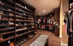 the closet is full of shoes and handbags