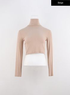 solid-long-sleeve-turtleneck-crop-io320 / Beige Classic Fitted Elastane Tops, Fitted Beige Plain Top, Fitted Plain Turtleneck Top, Fitted Turtleneck Plain Top, Minimalist Solid Color Top For Fall, Classic Fitted High Neck Top, Minimalist Solid Top For Fall, Fitted Basic Top For Workwear, Fitted Solid Color Minimalist Tops