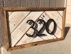 a wooden sign with the number thirty three on it