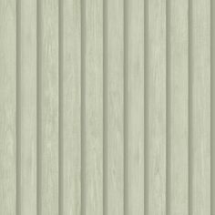 a white wooden wall with vertical slats on the top and bottom paneled in light green