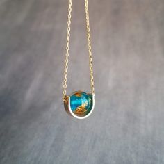 Eclipse Necklace Gold Over Blue Glass Ball Necklace Gold - Etsy Eclipse Necklace, Tiny Planet, Teal Glass, Gold Leaf Earrings, Heirlooms Jewelry, Belt Jewelry, Fall Earrings, Turquoise Glass, Ball Necklace