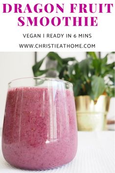 a smoothie in a glass with the text 5 min dragon fruit smoothie recipe