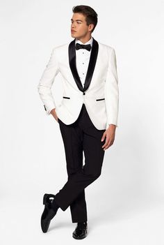 An off-white dinner jacket paired with double-pleated black tuxedo pants and a bow tie is one of the most elegant options when it comes to formal wear, and makes you stand out in style. It’s sure to work well for black tie events, as well as formal daytime events and summerly formal occasions. The Pearly White tuxedo features a satin shawl lapel and has been manufactured to have a stylish and modern fit. White Tuxedo Wedding, Wedding Affordable, Black Dress Shirt Men, Groom's Attire, White Wedding Suit, Groom's Suit, White Tux, Wedding Tux, Prom Tuxedo