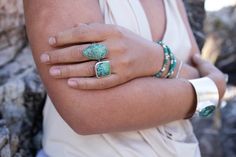 Lovely and unique Genuine Turquoise Ring set in Beaten 92.5% Sterling Silver Band. Size 7 US Height of face of stone - 19mm Width of face of stone - 19mm Turquoise is perhaps the oldest stone in man's history, the talisman of kings, shamans, and warriors. It is a stone of protection, strong and opaque, yet soothing to the touch, healing to the eye, as if carved from an azure heaven and slipped to earth. -------------------------------------------------------------------------- Bohemian Turquoise Gemstone Ring, Bohemian Green Jewelry With Gemstone Accents, Bohemian Green Turquoise Gemstone Ring, Bohemian Turquoise Rings With Gemstone Accents, Turquoise Bohemian Rings With Gemstone Accents, Bohemian Green Rings With Gemstone Accents, Unique Turquoise Rings With Gemstone Accents, Turquoise Statement Ring, Black Freshwater Pearls