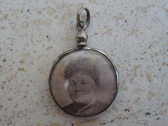 Antique French silver ( MARKED ) photo holder locket medal medallion photo locket pendant of French lady and man, The shrine can be opened. So it is possible to place photos of for example your children or others. Measures: 0,93 x 1,27 inches ( 2,37 x 3,24 cm ) I bought locket on a brocante ( fleamarket ) in France. If you don't have paypal, you can pay by bank transfer. Registered shipping is possible. If you have questions you always can contact me. Watch also my other religious items. Registe French Lady, Z Photo, Catholic Medals, Photo Holder, Photo Holders, Photo Locket, French Women, Bank Transfer, French Antiques