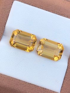 .70 Carats Outrageous Custom Emerald Cut Citrine Pair Weight: 11.70 Carats  Size: 13x9.3x6.9 mm 13x9.3x6.8 mm Clarity: Clean Origin: Brazil Discount for Repeat Customers & for Multiple Orders. NOTE: Kindly, Note that all photos are taken in the best enviroment to keep & obtain the true color. However, Various monitor's calibration final color could be a very little different. Refer to the size for the correct dimension of a gem. All gems are natural and not treated unless otherwise mentioned in Classic Topaz Gemstones As A Gift, Classic Octagon Gia Certified Gemstones, Classic Faceted Rectangular Jewelry, Classic Rectangular Faceted Jewelry, Elegant Yellow Faceted Gemstones, Gia Certified Octagon Gemstones For Anniversary, Formal Yellow Faceted Jewelry, Formal Yellow Baguette Cut Jewelry, Octagon-shaped Citrine Jewelry For Anniversary