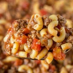 a spoon full of chili macaroni and cheese