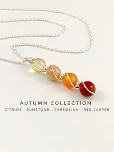 Natural Genuine Crystal necklace, including Citrine, Sunstone, Carnelian & Red Jasper The perfect necklace for anyone who loves the warm fiery colours of the autum season! This necklace puts together autumnal tones inspired by the pumpkins, bonfires, the low sunshine and turning colours of nature   THE STONES- *CITRINE- a little stone of the sun will add a bit of shine to your life. It is considered the stone of abundance and success, a wonderful stone to help manifest your goals! *SUNSTONE a stone of happiness and good luck, it can help to heal with loss or emotional dependency and fear and encourage independence and self-empowerment. *CARNELIAN - often called the 'stone of the sun' and the 'stone of passion' a crystal of ambition, drive, and determination, it is thought to be helpful whe Orange Gemstone Necklaces As A Gift, Orange Gemstone Necklace In Sterling Silver, Orange Sterling Silver Jewelry With Natural Stones, Orange Pendant Necklace With Birthstone, Orange Birthstone Pendant Necklace, Orange Birthstone Necklace As Gift, Orange Birthstone Necklace Gift, Amber Sterling Silver Necklace For Healing, Orange Gemstone Crystal Necklace For Gift