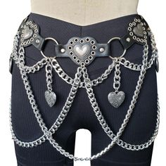 This Navajo Style Antique Heart Black Leather Concho Western Chain Belt is a true masterpiece. Crafted with precision and attention to detail, it combines the timeless beauty of antique design with the durability of black leather. The conchos add a touch of western charm, making it a perfect accessory for those who love a rustic yet stylish look. Whether you're pairing it with jeans for a casual outing or with a dress for a more unique ensemble, this belt is sure to turn heads. It's a unique piece that brings a touch of the wild west to your wardrobe. This waist chain  is made to order and handcrafted, so it will take me about 3~5 working days to make and dispatch.For more information on shipping take a look at my 'About' section on my shop page or my FAQ. Thank you and if you have any oth Gothic Belts, Western Chain Belt, Bird Clothes, Gothic Chain Belt, Gothic Metal Chain Belt, Gothic Leather Corset Belt, Western Goth, Gothic Leather Harness With Belt, Unique Pies