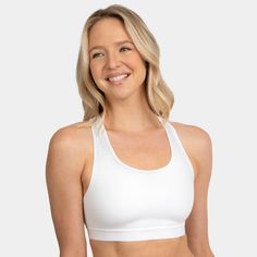 Introducing the Fruit of the Loom Medium Impact Wireless Sports Bra, the perfect addition to your workout wardrobe. This full coverage sports bra provides you with the necessary support and comfort during low to medium impact activities such as yoga, cycling, walking and lounging. Made with a non-padded design, this sport bra is perfect for those who prefer a natural look and feel. The smoothing racerback and wide comfort straps ensure that the bra stays in place while you move, allowing for a f Workout Racerback Bra With Built-in Padding, Sports Bra With Built-in Padding For Yoga, Supportive Sports Bra With Built-in Padding For Light Sports, Supportive Sports Bra With Built-in Bra For Light Sports, Compressive Sports Bra With Built-in Padding For Light Sports, Racerback Sports Bra With Built-in Padding For Light Exercise, Solid Sports Bra With Medium Bust Support For Yoga, Supportive Activewear With Built-in Bra For Light Sports, Solid Color Athleisure Bra For Light Exercise