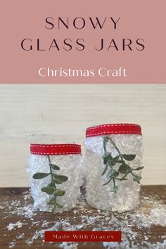 snowy glass jars with christmas decorations on them