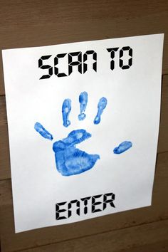 a hand print on a piece of paper that says scan to enter