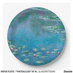 a blue plate with water lilies on it