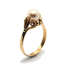 Wonderful handmade 14 ct gold pearl ring , antique style and very unique . Made by myself .  size : adjustable weight : 2.5 gram gemstone size : main pearl - 7 mm worldwide free shipping Engagement Rings Pearl, Rose Gold Pearl Ring, Rings Pearl, Pearl Cluster Ring, Pearl Rings Vintage, Antique Style Rings, Pearl Engagement Ring, Gold Pearl Ring, Dainty Gold Rings