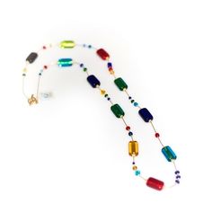 "ESTATE long colored beads necklace Beautiful, long Murano glass beaded necklace, entirely realized by hand with \"submerged\" gold leaf details on multicolored glass. This artwork, with its unique design and vibrant colors, is a precious creation to complete with elegance any outfit or to surprise anybody with a unique gift idea. Availability: in stock Shipment: in 24 hrs - only 1 left in stock Length: 90 cm / 35\" Weight: 110 gr / 0,24 lb Trademark Of Origin Code: 065 Free shipping worldwide H Gold Leaf Jewelry, Diy Choker, Glass Beads Jewelry, Murano Glass Beads, Leaf Jewelry, Necklace Long, Classic Jewelry, Glass Bead Necklace, Glass Necklace