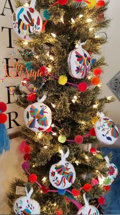 a decorated christmas tree with ornaments on it