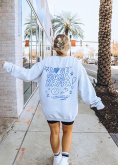 Soft, cute, and trendy, this Sigma Kappa crewneck will quickly become your go-to cozy sweatshirt! Use the drop down to specify preference between white, sandstone, light blue, ash, or classic pink. LISTING IS FOR SIGMA KAPPA. Please be sure you are ordering for your correct Sorority.  We print on high quality, soft, & heavyweight materials, sustainably made and printed in the US. ♥ SIZING ♥ Unisex Sizing- For a more feminine, fitted look we recommend getting your size. For a more oversized look, we recommend sizing up. ♥ SHIP TIME ♥ Items may take up to 7 business days to process before shipping. Shipping time is (on average) an ADDITIONAL 2-5 business days. Shipping times vary for many reasons, but is largely influenced by your location. ♥ CARE INSTRUCTIONS ♥ Wash garments inside-out, wit Big Little Sorority, Anti Valentines Day, Love Doodles, Alpha Sigma Alpha, Kappa Delta, Future Mrs, Christian Sweatshirt, Sorority Gifts, Alpha Phi